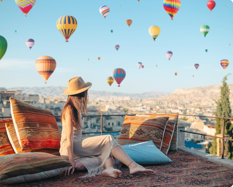Couple sitting on a scenic overlook